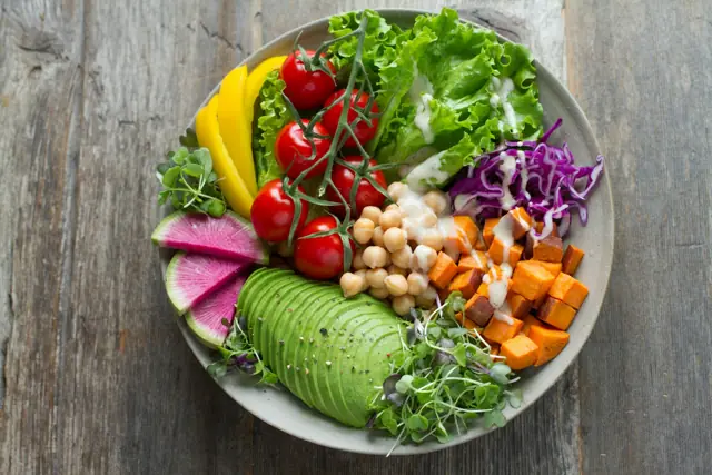 Bowl of vegetables, chickpeas and avocado