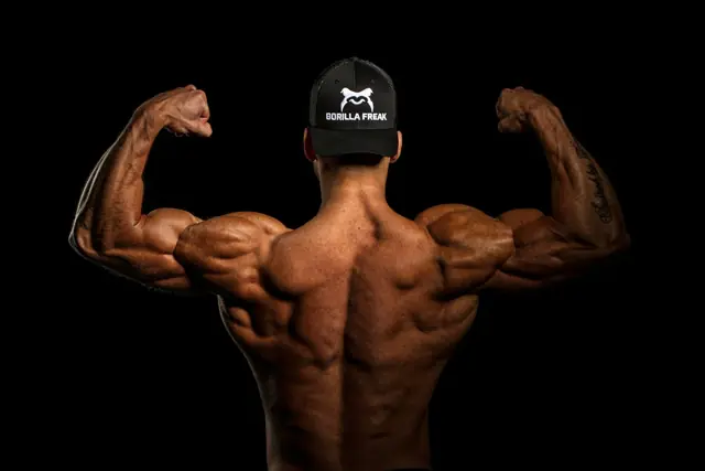 Bodybuilder showing his back muscles